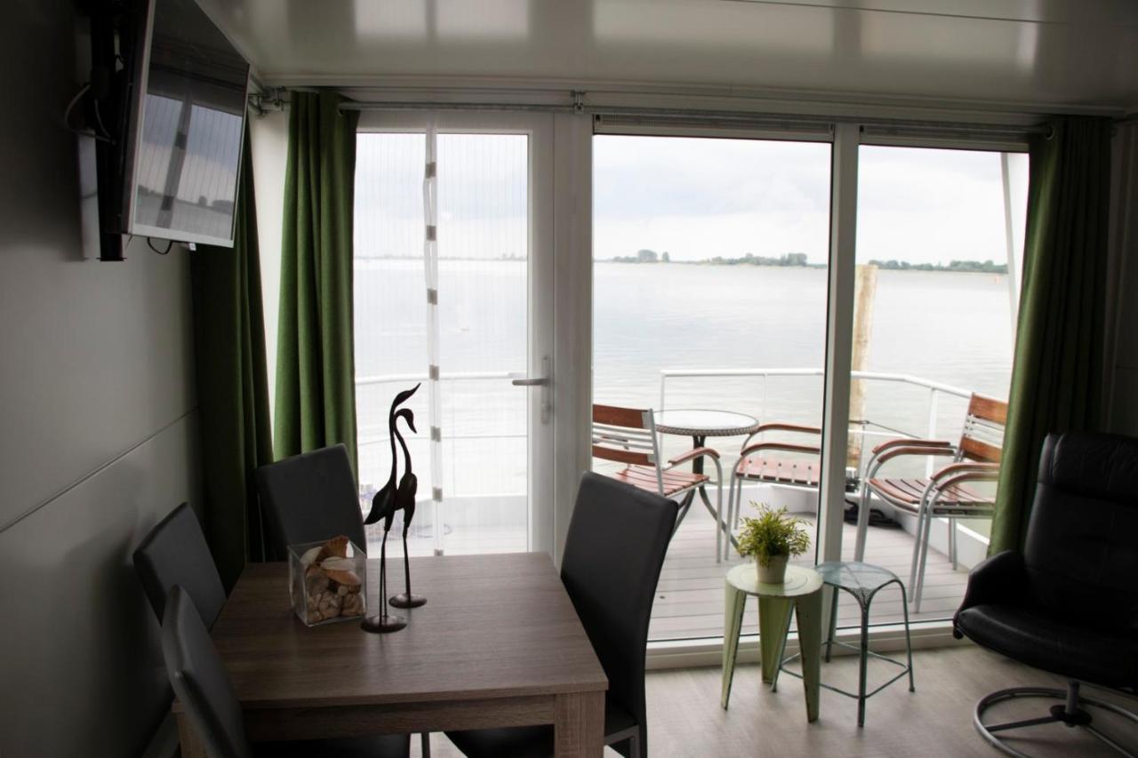 Houseboat uitzicht over veluwemeer, natuurlokatie, prachtige vergezichten Biddinghuizen Buitenkant foto