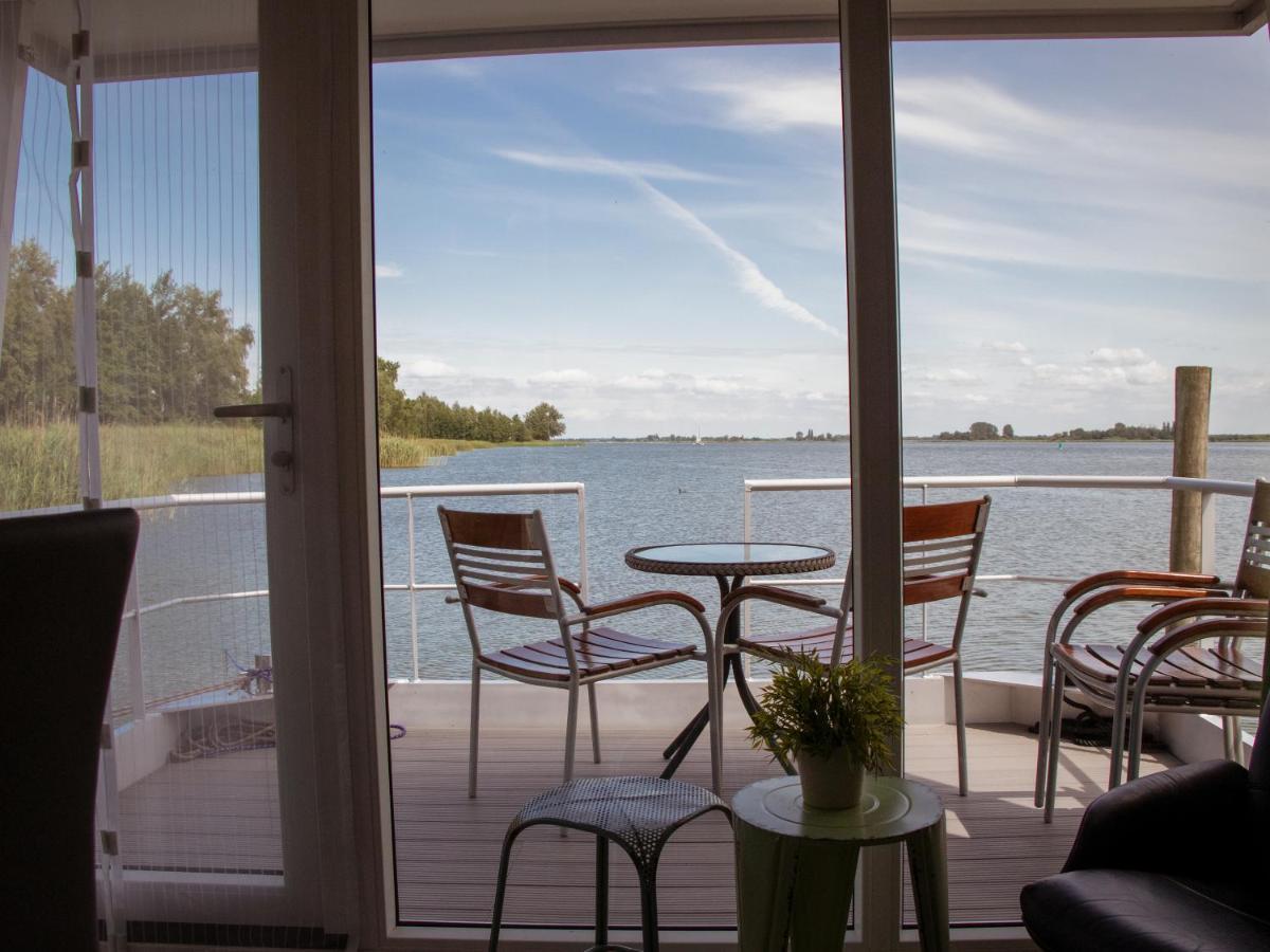 Houseboat uitzicht over veluwemeer, natuurlokatie, prachtige vergezichten Biddinghuizen Buitenkant foto